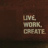 red brick wall with live, work, create. quote