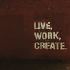 red brick wall with live, work, create. quote