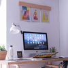 white iMac on brown wooden desk