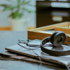 black headphones on laptop computer